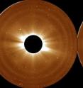 Scientists used these observations of the sun's atmosphere (the bright light of the sun itself is blocked by the black circle at the middle) from NASA's Solar Terrestrial Relations Observatory on Aug. 5, 2007, to define the outer limits of the solar atmosphere, the corona.