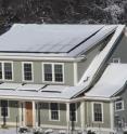 Despite a harsh winter that left the Net-Zero Energy Residential Test Facility's photovoltaic and solar thermal panels covered with snow on 38 days, the energy-efficient house produced more energy than it used over the course of a year.