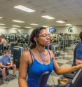 Michigan State University students work out in one of the college's campus fitness centers. A new MSU study indicates that students who were members of a gym had higher GPAs than those who weren't.