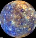 This is Mercury, with colors enhanced to emphasize the chemical, mineralogical and physical differences among the rocks that make up its surface.