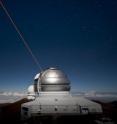The Gemini North telescope on Hawaii's Mauna Kea aims a laser beam into the night sky to create an "artificial star" that astronomers use to adjust images made by the telescope to remove the blurring effects of Earth's atmosphere. The telescope was used in a new University of Utah-led study that discovered the smallest galaxy yet known to harbor a supermassive black hole. (More Gemini images at <a target="_blank"href="http://www.gemini.edu/images">www.gemini.edu/images</a>.)