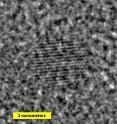 This is a high-resolution transmission electron microscope photograph of a single silicon nanoparticle.
