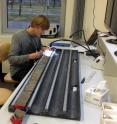 This image shows University of Utah geochemist Gabe Bowen working on Wyoming sediment cores at a lab in Germany for a study that showed today's global warming is more similar than had been thought to a climate change episode almost 56 million years ago.