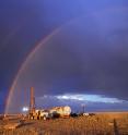 A rainbow appears over National Science Foundation-funded drilling site in Wyoming's Bighorn Basin. In a study led by University of Utah geochemist Gabe Bowen, sediment cores drilled at the site revealed a global warming episode almost 56 million years ago resembled today's in terms of the size and duration of carbon releases to the atmosphere.