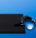 University of Rochester's Institute of Optics Professor Chunlei Guo has developed a technique that uses lasers to render materials hydrophobic, illustrated in this image of a water droplet bouncing off a treated sample.
