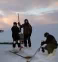 DRI and NASA JPL engineers prepare coring device to sample thermokarst lake sediments in early November on the North Slope of Alaska.