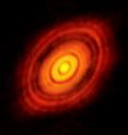 This image sparked scientific debate when it was released last year, with researchers arguing over whether newly forming planets were responsible for gaps in the dust and gas swirling around the young star.