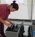 First author Andrea Marzi, Ph.D., of NIAID's Laboratory of Virology, is shown in August 2014 analyzing Ebola test results from the ELWA3 hospital compound in Monrovia, Liberia.