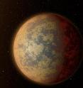 This artist's rendition shows one possible appearance for the planet HD 219134b, the nearest rocky exoplanet found to date outside our solar system. The planet is 1.6 times the size of Earth, and whips around its star in just three days. Scientists predict that the scorching-hot planet -- known to be rocky through measurements of its mass and size -- would have a rocky, partially molten surface with geological activity, including possibly volcanoes.