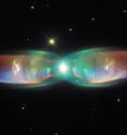 The Twin Jet Nebula, or PN M2-9, is a striking example of a bipolar planetary nebula. Bipolar planetary nebulae are formed when the central object is not a single star, but a binary system, Studies have shown that the nebula's size increases with time, and measurements of this rate of increase suggest that the stellar outburst that formed the lobes occurred just 1200 years ago.