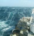 A research vessel ploughs through the waves, braving the strong westerly winds of the Roaring Forties in the Southern Ocean in order to measure levels of dissolved carbon dioxide in the surface ocean.
