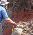 Paul Renne inspects a reddened soil horizon between lava flows in the Deccan Traps region of India. Renne is director of the Berkeley Geochronology Center and a professor-in-residence at UC Berkeley.