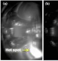 Figure 2: Infrared images of disruption heat loads on the first wall of DIII-D tokamak, when mitigated by pellets composed of (a) pure deuterium (b) mixture of deuterium and neon and (c) pure neon. Bright spots indicate high wall temperature. Primary heat loads occur where magnetic field lines intersect the wall, near bottom right of each image (hot spot indicated by arrow).