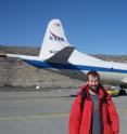 CReSIS researcher John Paden of the University of Kansas is shown with NASA P3 aircraft deployed to collect Greenland data for Operation IceBridge.
