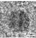 A transmission electron microscope image of a single iron pyrite quantum dot on the left and a graph that shows the size distribution of the fool's gold quantum dots that they added to standard lithium batteries.
