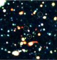 Example of Monstrous Galaxies. On the left is the image taken at sub-millimeter wavelengths with ASTE. It looks like there is one bright monstrous galaxy. In the center is an image taken at the same sub-millimeter wavelengths, but this time using the new radio telescope facility ALMA. With 60 times better resolution and 10 times better sensitivity, we can see that actually there are 3 monstrous galaxies close together. On the right is the same region photographed in visible light by the Subaru Telescope. We can see that not all of the monstrous galaxies show up in this picture, or at the least that some of them must be very faint.