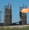 Global fossil-fuel emissions, like the CO2 emitted from the natural-gas flare at this North Dakota oil well, could show a decline this year, says a Stanford-led Global Carbon Project report.