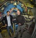 Postdoc Prithwish Tribedy and Brookhaven physicist Paul Sorensen at the STAR detector at the Relativistic Heavy Ion Collider (RHIC).