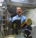 PNNL researcher Xiaoliang Wei prepares a small demonstration organic flow battery.