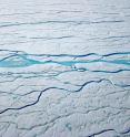 These are rivers of meltwater forming on the Greenland ice sheet and flowing toward the sea.