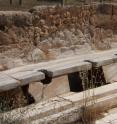 This is a photograph of Roman latrines from Lepcis Magna in Libya.