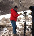 Denis Lacelle of University of Ottawa (left) and Alfonso Davila of NASA/SETI (right) operate a motorized ice drill to obtain cores in ice-cemented ground in University Valley.