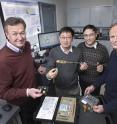 This photos shows nuclear theorist Dmitri Kharzeev of Stony Brook University and Brookhaven Lab with Brookhaven Lab materials scientists Qiang Li, Genda Gu, and Tonica Valla in a lab where the team measured the unusual high conductivity of zirconium pentatelluride.