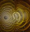 This is a simulation of two merging black holes, creating gravitational waves.