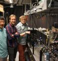 Brian Zhou, Christopher Yale, and F. Joseph Heremans, researchers at the University of Chicago's Institute for Molecular Engineering, with the optical apparatus they used to control geometric phases in diamond.