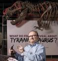 Hans Sues, Chair, Department of Paleobiology, National Museum of Natural History, Smithsonian Institution is holding a cast (right hand) of a <em>Tyrannosaurus Rex</em> tooth for comparison with an actual tooth of the new tyrannosaur <em>Timurlengia euotica</em>, from the Late Cretaceous Period that was found in the Kyzylkum Desert, Uzbekistan. The fossilized remains of a new horse-sized dinosaur, <em>Timurlengia euotica</em>, reveal how <em>Tyrannosaurus rex</em> and its close relatives became top predators, according to a new study published in the <em>Proceedings of the National Academy of Sciences</em>.