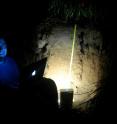 Hirmas uses his MLT scanner at night in a soil pit. Ambient daylight interferes with the detection of the pores. Cooler night temperatures also allow the scanner to stay cool and minimize the evaporation of water from the surface during the scanning procedure.