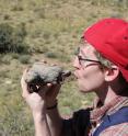 Adam Huttenlocker identifies a small therapsid fossil at one of the study sites.