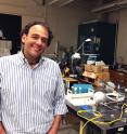 Researchers now believe they understand why oversized microgel particles spontaneously shrink to allow formation of colloidal crystals in assemblies of smaller microparticles. Shown in a laboratory used to study the particles is Georgia Tech Associate Professor Alberto Fernandez-Nieves.