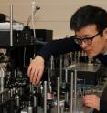 This is Bristol PhD student Xiaogang Qiang and the primitive photonic quantum processor he designed with UWA researchers to simulate quantum walks.