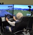One of the 59 volunteers in a distracted driving study by the University of Houston and Texas A&M Transportation Institute sits in a high-fidelity driving simulator.