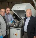 Researchers from Argonne's Surface and Lubrication Interaction, Discovery and Engineering initiative developed a novel "diamond-like" coating that could prove of great benefit when used to coat equipment for wind turbines, like the bearing in this photo. Pictured from left, Levent Eryilmaz, Giovanni Ramirez, Ali Erdemir and Aaron Greco.