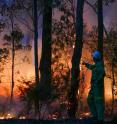 Prof Stefan Doerr of Swansea University with controlled fire, as part of his research into wildfires