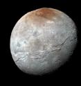 NASA's New Horizons captured this high-resolution enhanced color view of Pluto's moon Charon, showing the crack on the icy moon. It was taken just before closest approach on July 14, 2015. The image combines blue, red and infrared images and the colors are processed to best highlight the variation of surface properties across Charon.