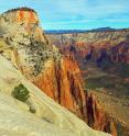 This view of Zion Canyon in Utah's Zion National Park shows the flat valley floor created when part of the peak named the Sentinel collapsed in a gigantic landslide, creating a dam and forming a lake, which eventually filled in with sediment. A new University of Utah study provides the first direct date for the landslide, determining it happened 4,800 years ago and showing it was so large that it would have covered New York City's Central Park with 275 feet of debris. This photo is the cover image for the June issue of the Geological Society America's journal <i>GSA Today</i>, which is publishing the Utah study.