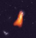 Hubble Space Telescope image of the galaxy with overlay of the hydrogen emission that was recently discovered.