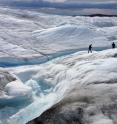 Researchers including the University of Georgia's Thomas Mote measure meltwater runoff from the ice sheet margin in Greenland during summer 2013.