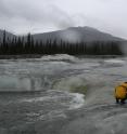 To better understand the impact of methane and carbon dioxide on climate change, ecologist Evan Kane samples thawing permafrost in Alaska.