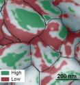 This atomic force microscopy image of the grainy surface of a perovskite solar cell reveals a new path to much greater efficiency. Individual grains are outlined in black, low-performing facets are red, and high-performing facets are green. A big jump in efficiency could possibly be obtained if the material can be grown so that more high-performing facets develop.