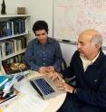 This photo shows UC Riverside astronomers Behnam Darvish (left) and Bahram Mobasher.