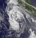 The image from GOES-West at 1500 UTC (11 a.m. EDT) showed the center of Tropical Depression 6E about 370 miles (595 km) south-southwest of Manzanillo, Mexico.