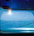 This is the selective laser melting process in action.