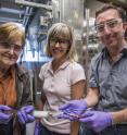 Berkeley Lab researchers (from left) Lara Gundel, Marion Russell, Hugo Destaillats demonstrate filling a glass syringe with vapor from an e-cigarette.