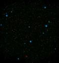 <p>The blue dots in this field of galaxies, known as the COSMOS field, show galaxies that contain supermassive black holes emitting high-energy X-rays. They were detected by NASA's Nuclear Spectroscopic Array, or NuSTAR, which spotted 32 such black holes in this field and has observed hundreds across the whole sky so far.

<p>The other colored dots are galaxies that host black holes emitting lower-energy X-rays, and were spotted by NASA's Chandra X-ray Observatory. Chandra data show X-rays with energies between 0.5 to 7 kiloelectron volts, while NuSTAR data show X-rays between 8 to 24 kiloelectron volts.