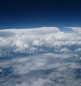 On this picture, thin mid-level clouds are observed in the foreground with deep convective clouds in the background.