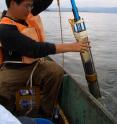 Co-author Enlou Zhang collecting a sediment core in Lake Erhai for analysis of midges.